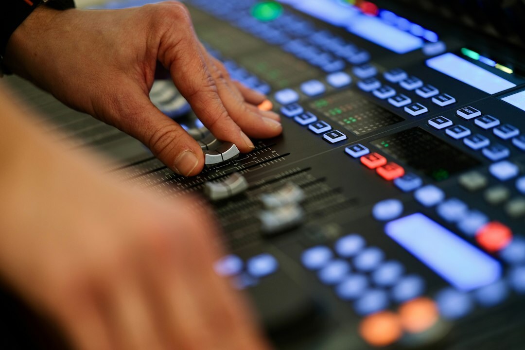 sound engineer at mixing desk