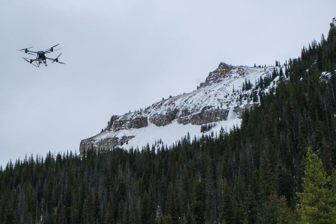 drone flying over mountains