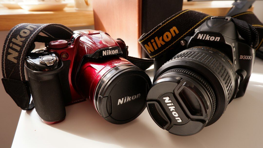 Professional camera and lenses laid out on a table